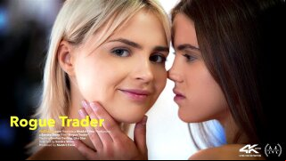 Cute blonde Lika Star is busy in her workshop, as Sandra Shines erotic movie Rogue Trader begins. Shes interrupted by the arrival of adorable brunette Evelina Darling, who pushes her broken-down scooter into the garage. Evelina watches with interest as the pretty mechanic works on her bike, then kisses her spontaneously. Lika is surprised and nervous at first, but soon responds to the sweet kisses as Evelina pushes her against a wall, squeezes her lovely small breasts and pulls off her overalls. She slides a hand into Likas white lace panties, then tugs them aside and kneels to lick her shaved pussy. Lika rocks her hips to ride the powerful sensations as Evelinas enthusiastic tonguing drives her wild. Shes eager to try it for herself now, stripping her new friend naked and sucking her diamond-hard nipples, lapping at her clit to give her an intense orgasm.
